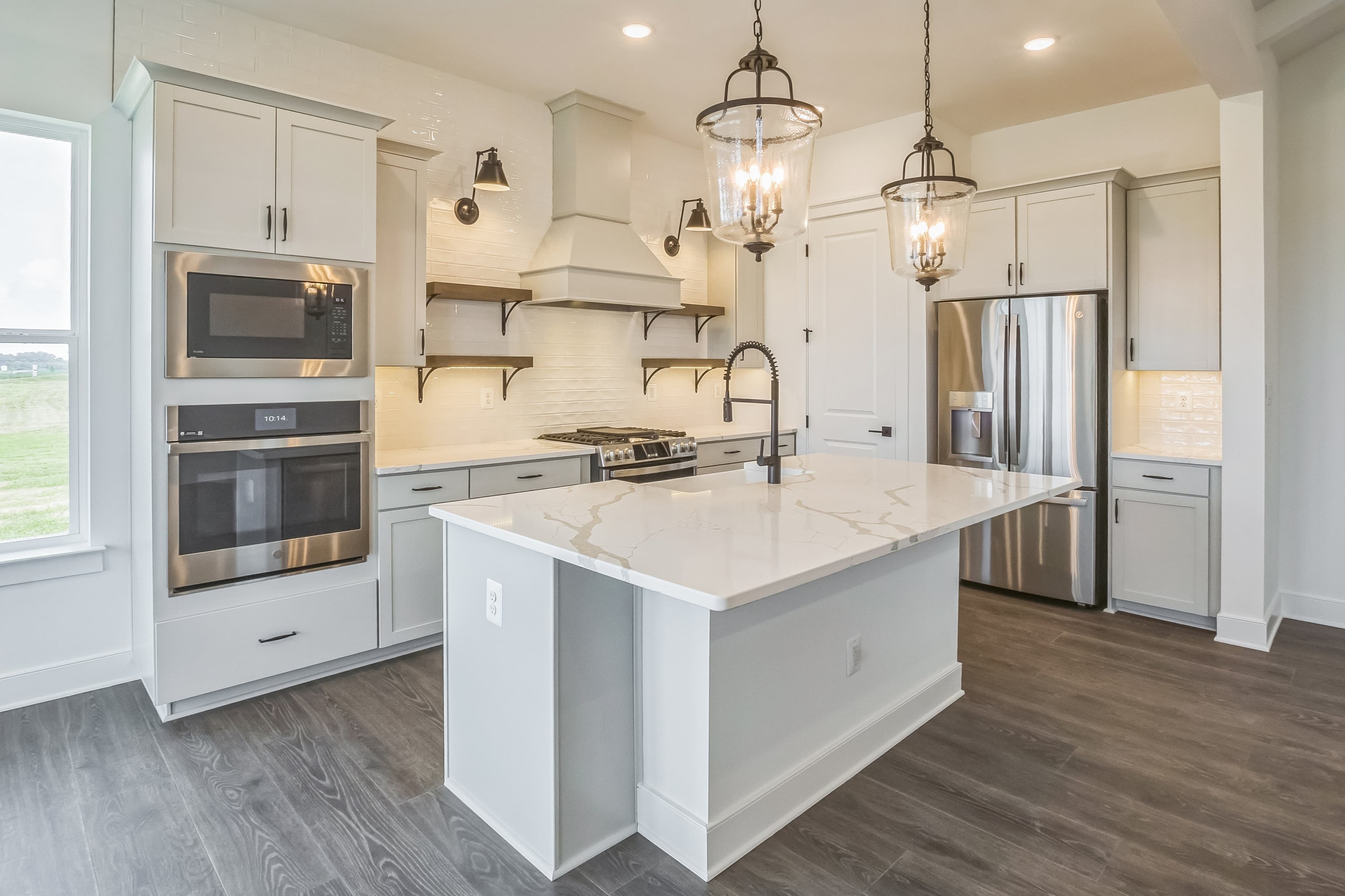 Kitchen with striking pendant lighting