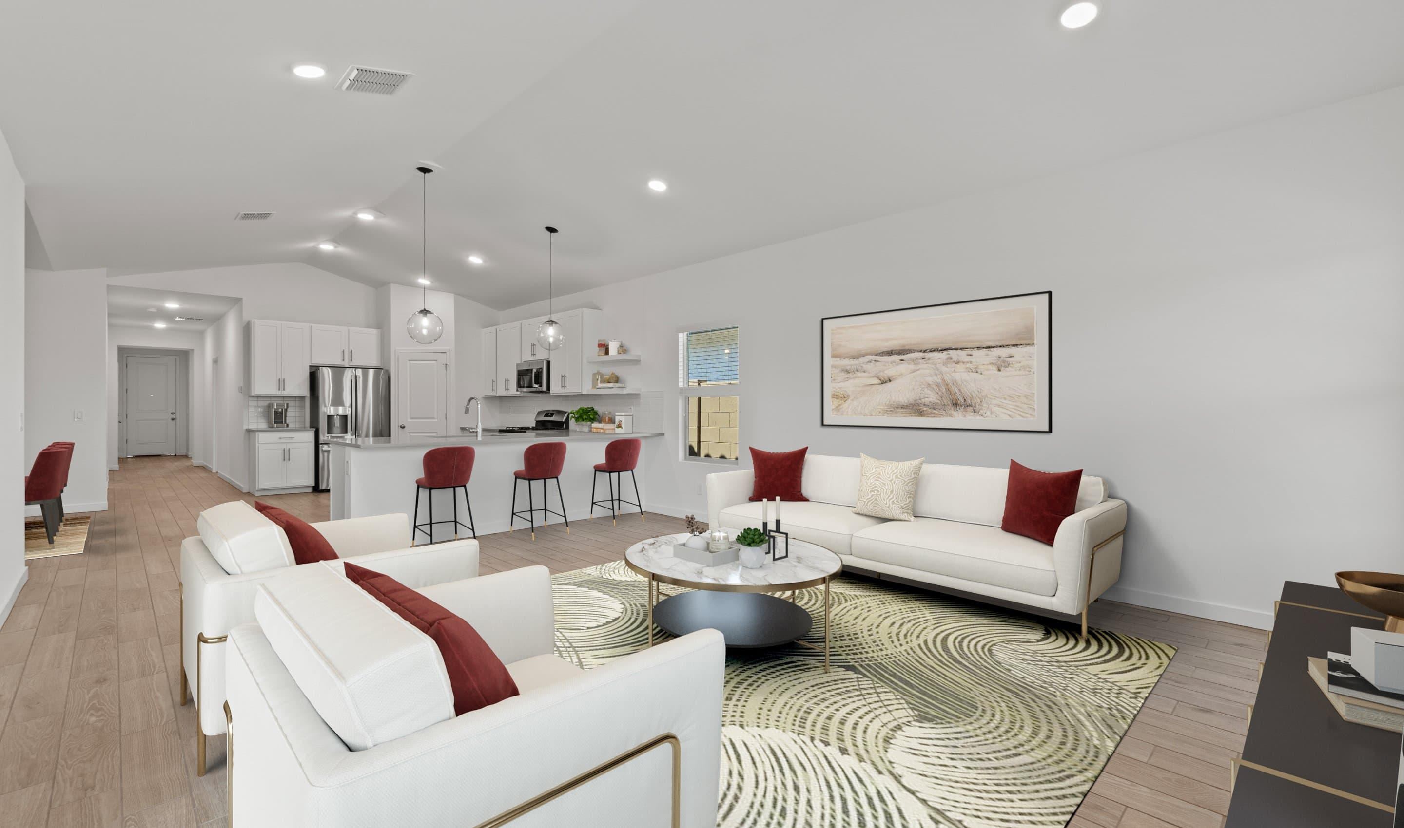 Open concept living spaces with vaulted ceiling