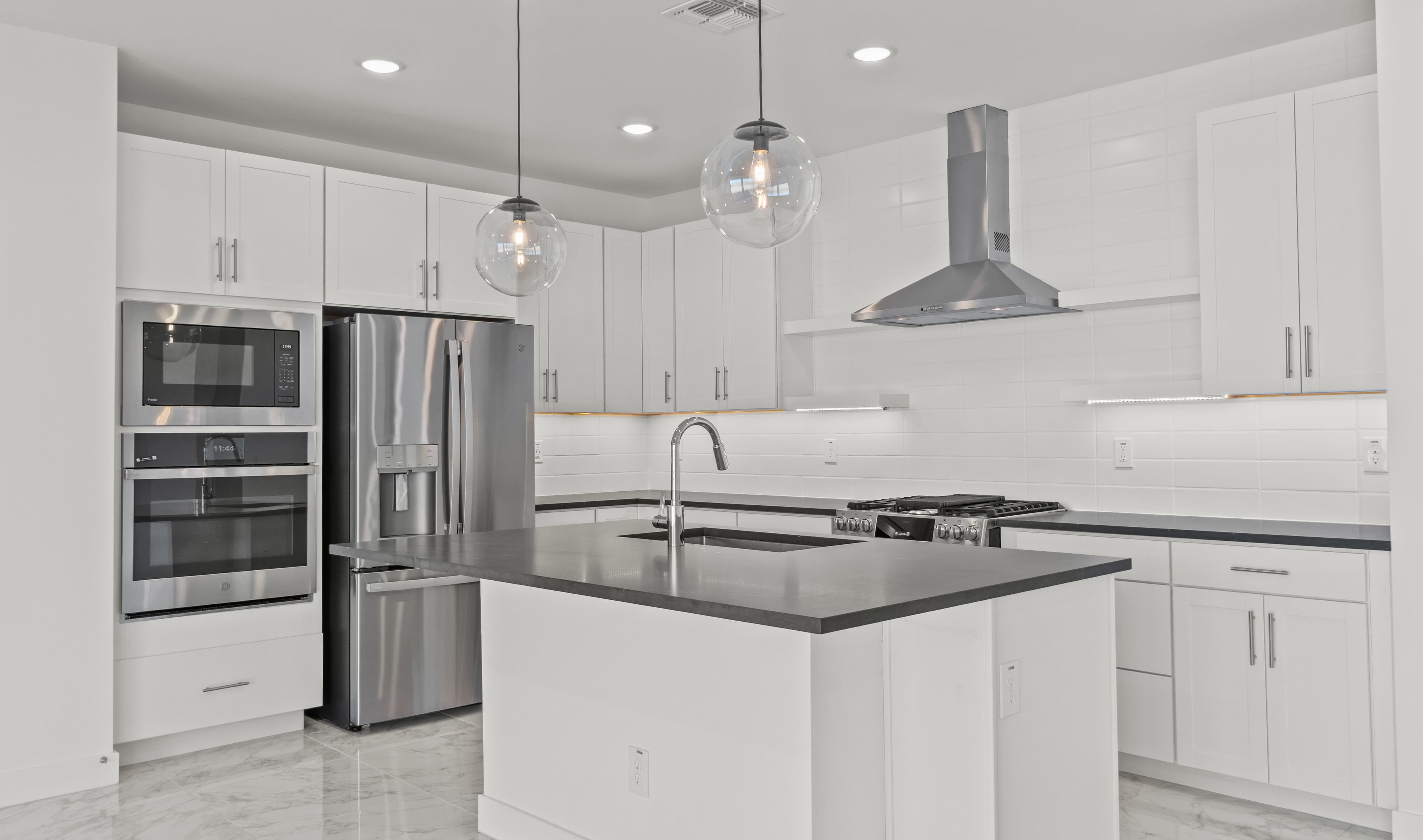 Kitchen with stainless-steel appliances