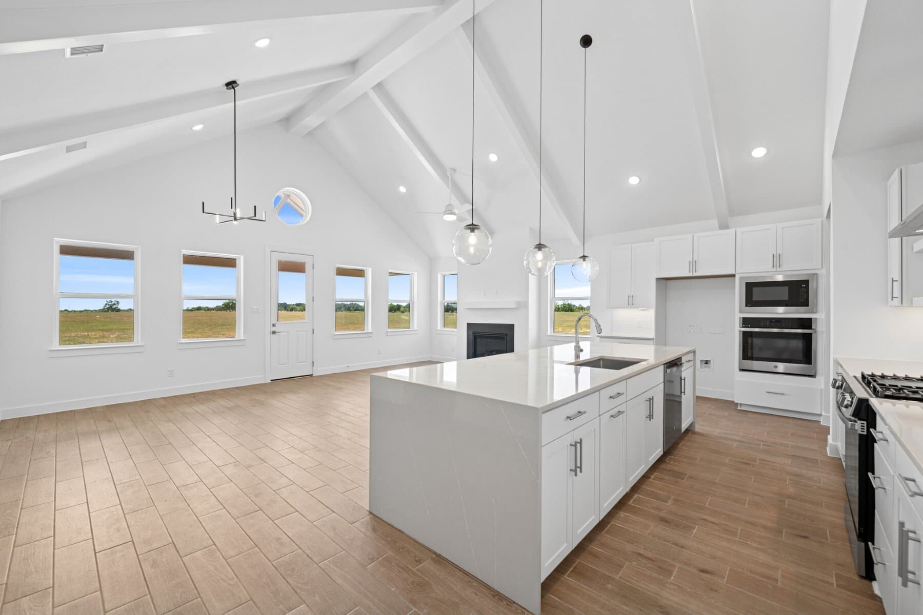 Kitchen with vaulted ceiling and ceiling beams