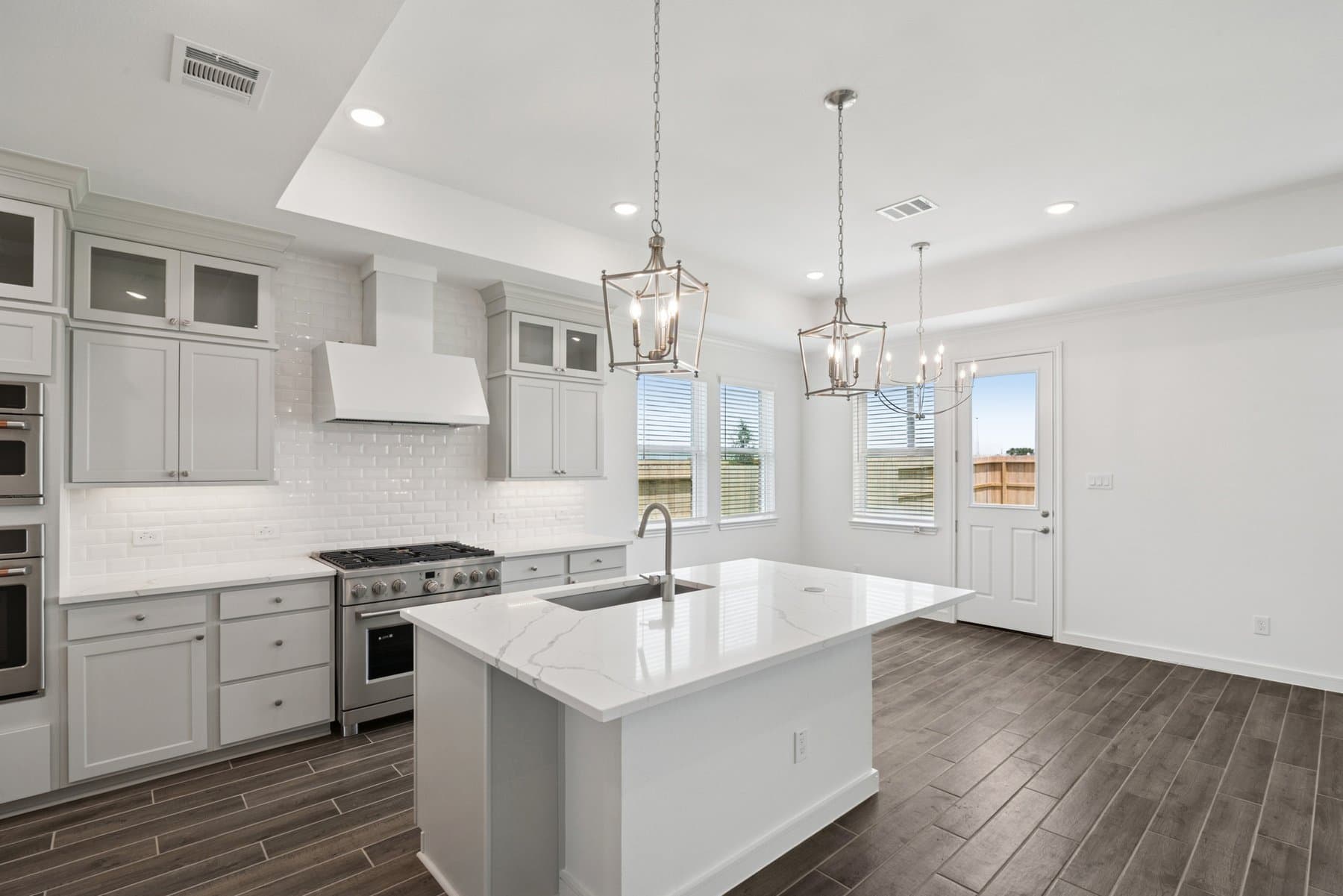 Kitchen with upper glass cabinets