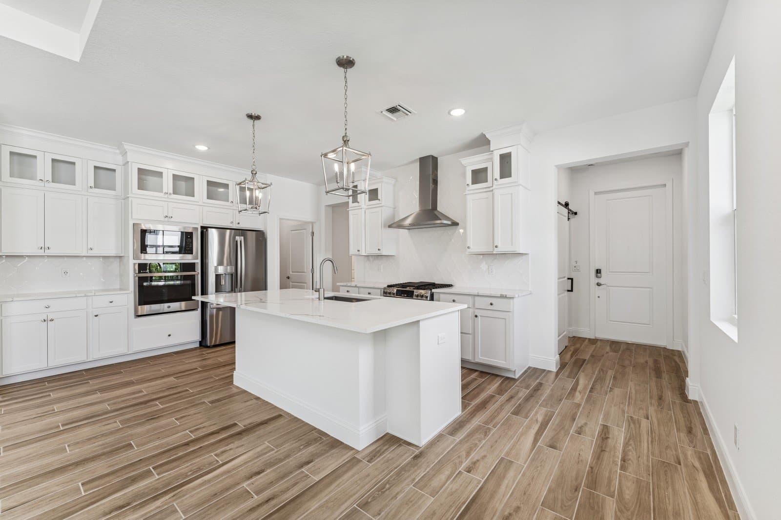 Kitchen featuring vast island