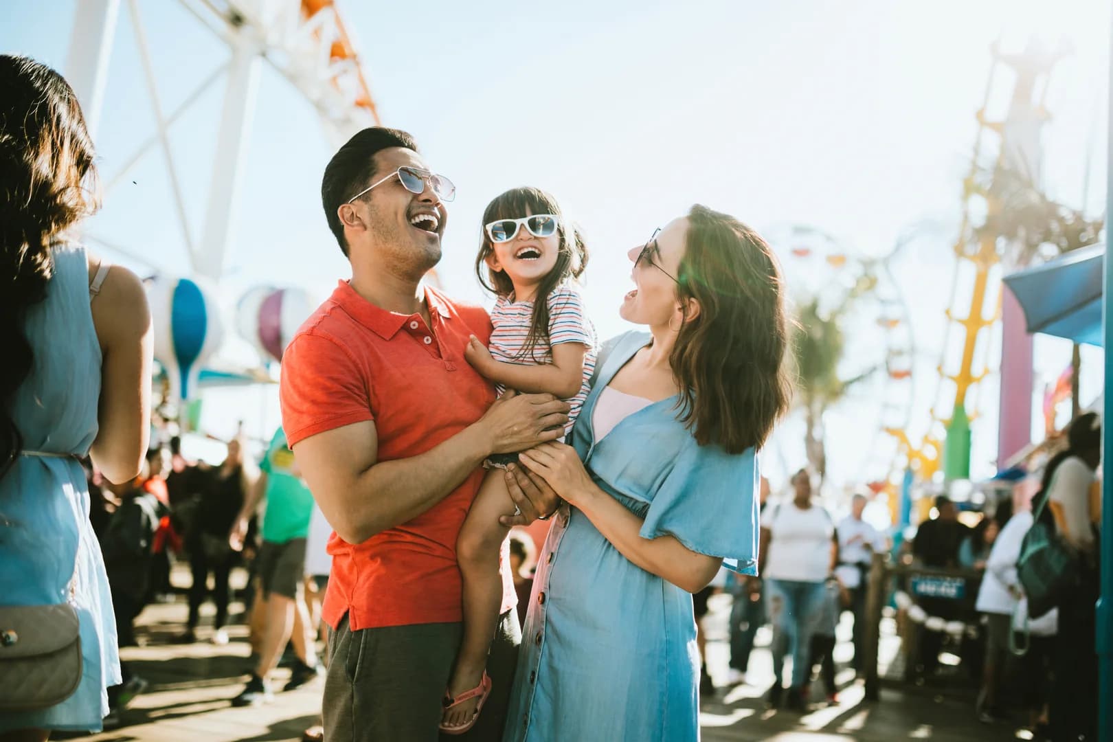 Family Having Fun at an Outdoor Street Fair