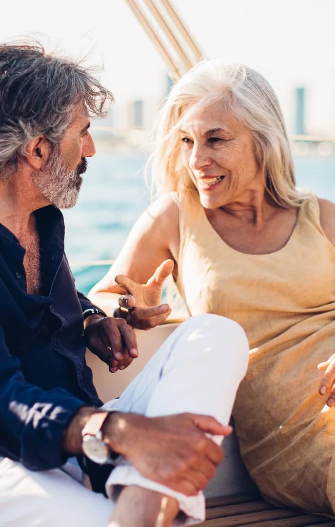 149503 Older Couple Dressed Nice on a Boat with City Background USP Crop