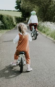 Young Kids Along a Pastoral Bike Path