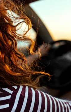 69396 Commuting Woman Driving Car USP Crop