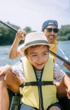 131458 Father and son kayaking on a lake USP Crop