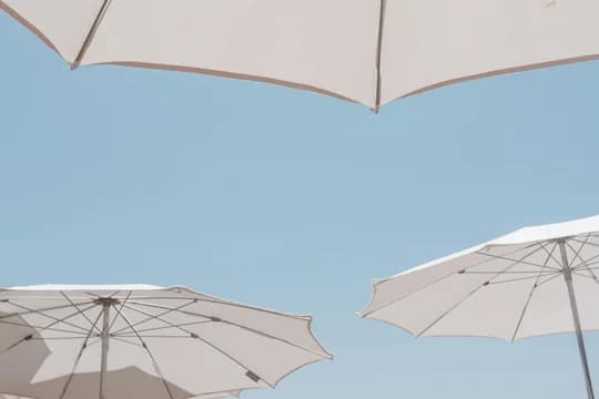 Banner Beach Umbrellas Against the Sky