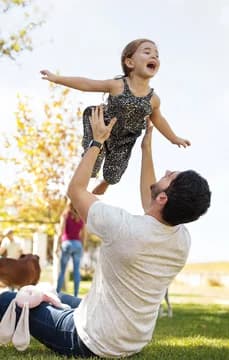 137863 Dad Playing With Daughter Outside USP Crop