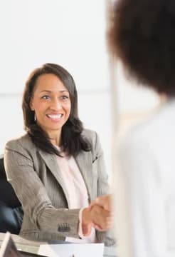 Professional Woman Shaking Hands