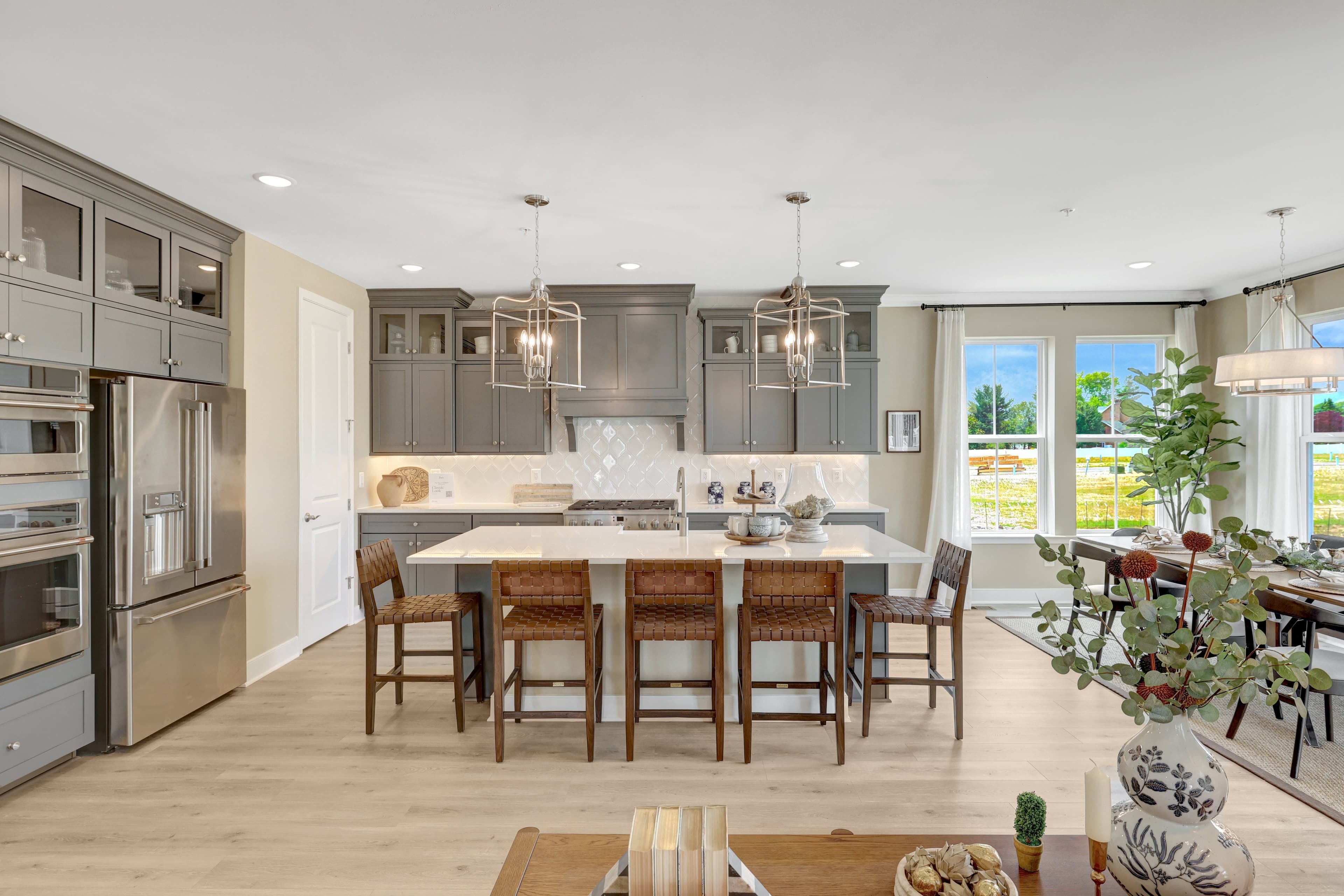 Kitchen with Greyhound cabinets and upper glass cabientry