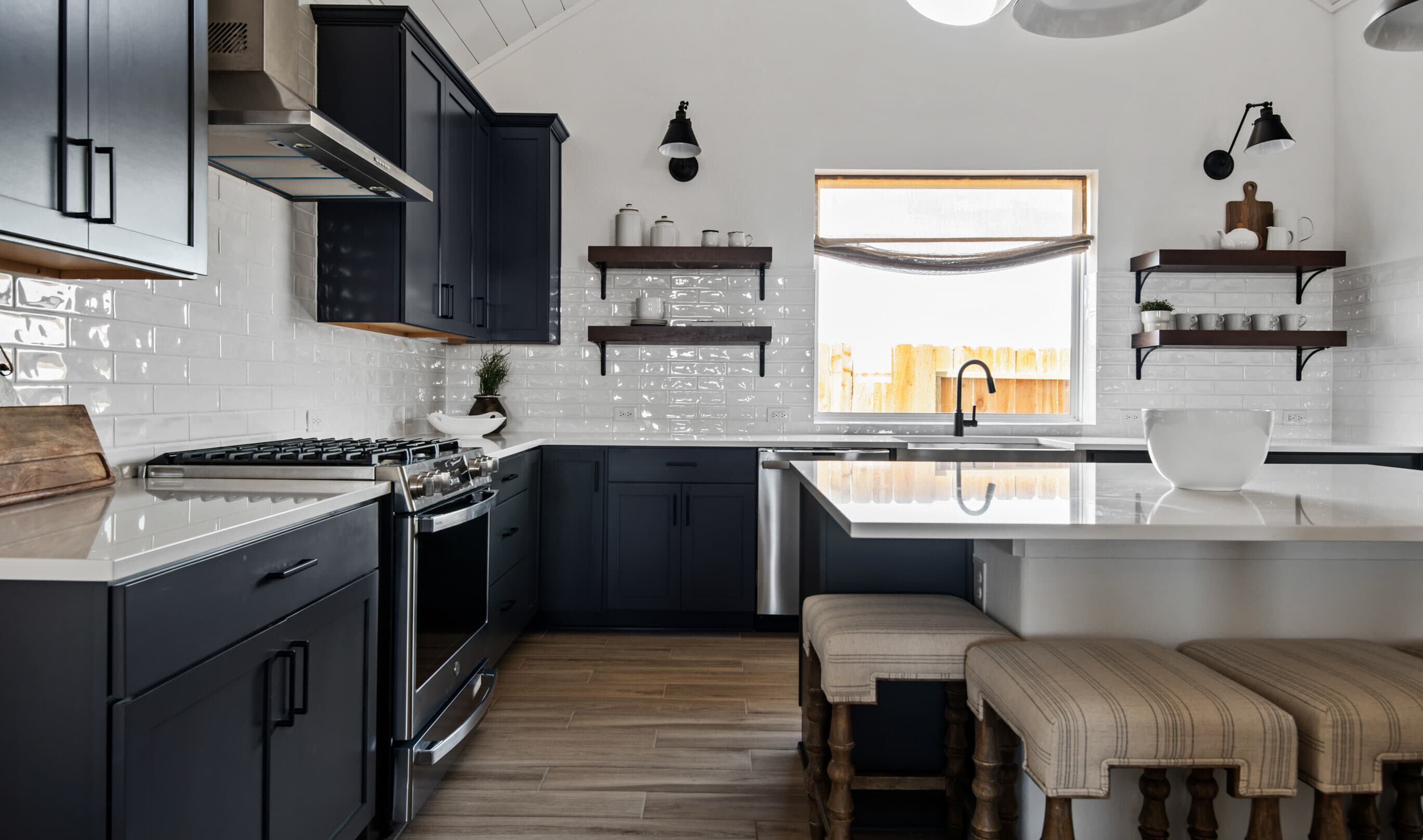 Floating shelves in the kitchen with subway tile backsplash