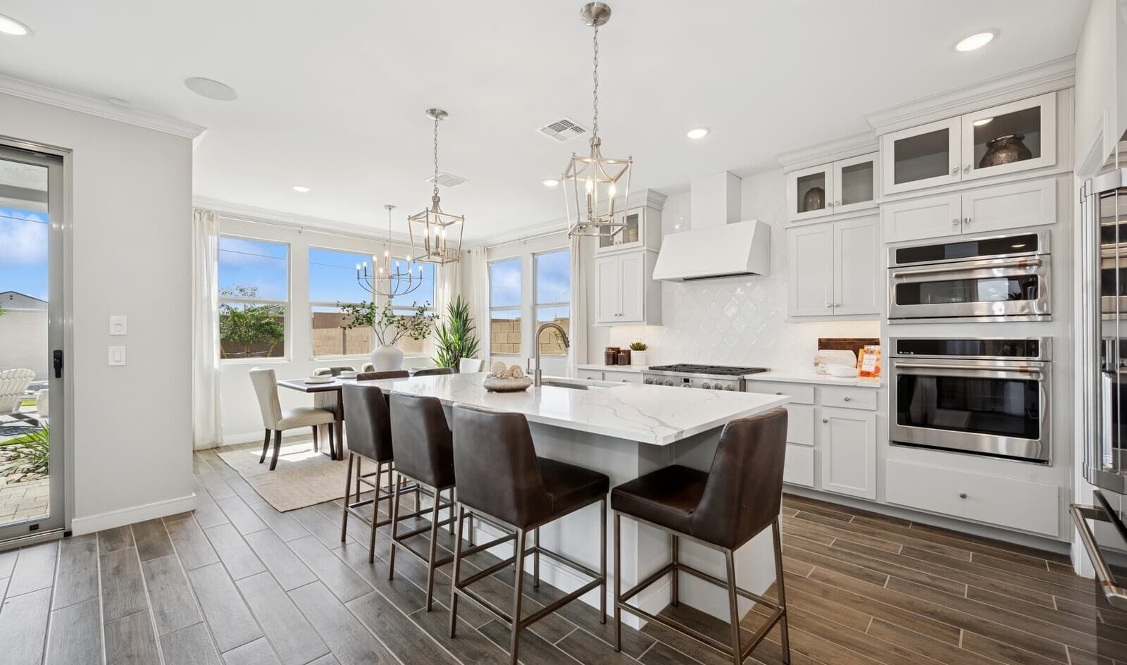 Gorgeous tile flooring and quartz countertops in the kitchen