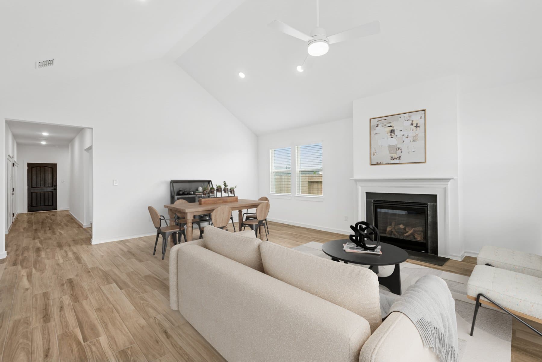 Cozy fireplace anchors the great room