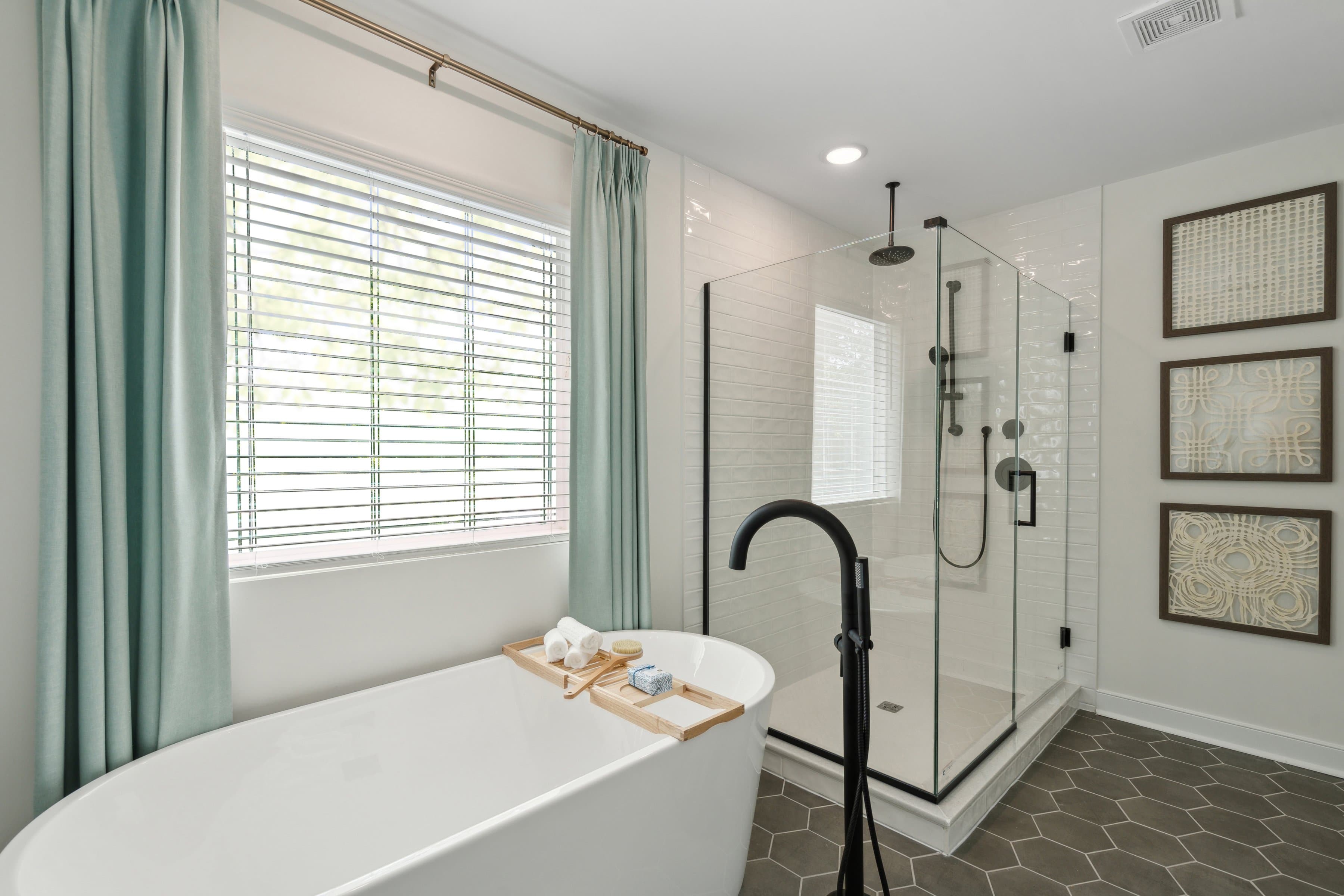 Primary bath with freestanding tub & glass shower enclosure