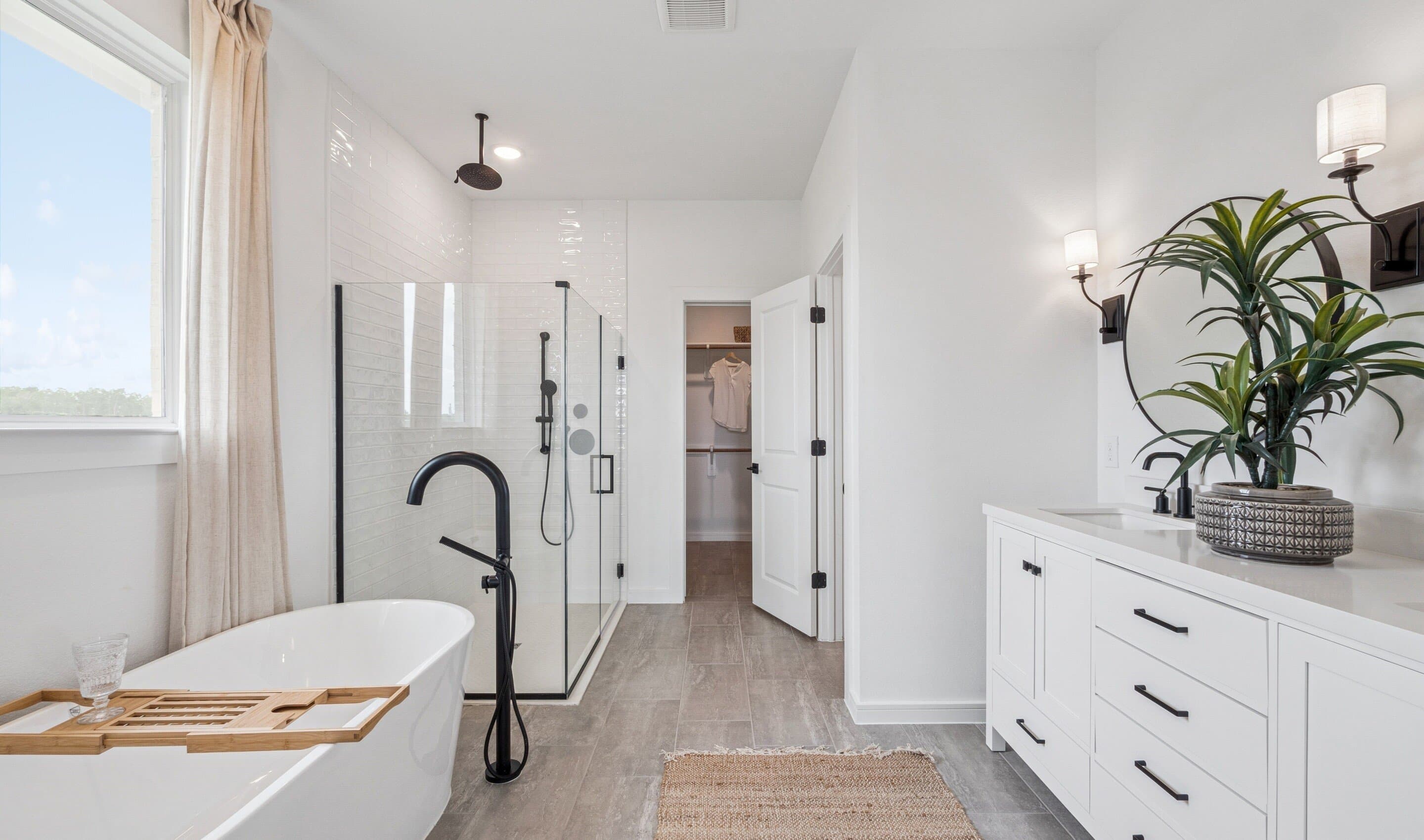 Primary bath with glass shower enclosure