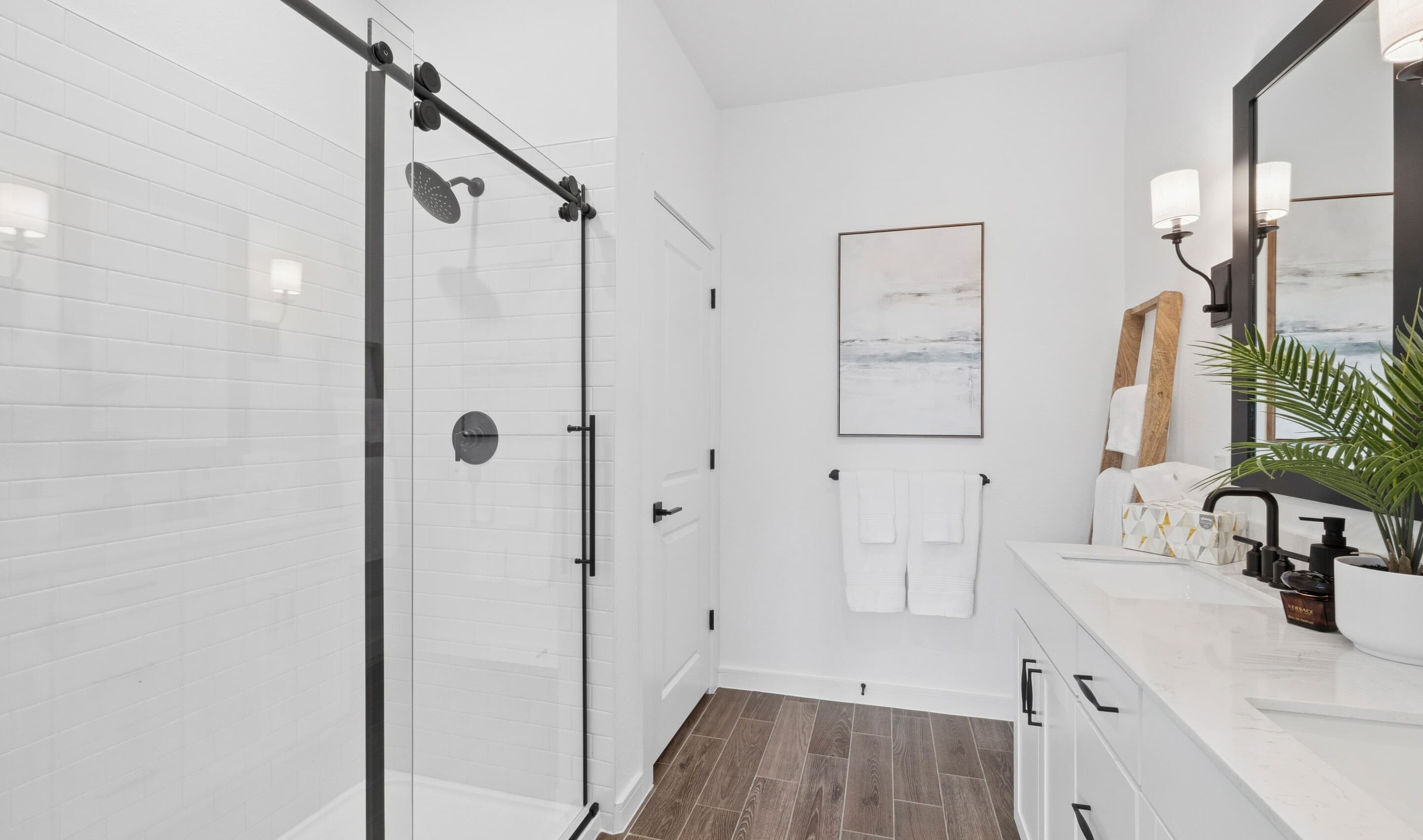 Primary bath with glass shower enclosure