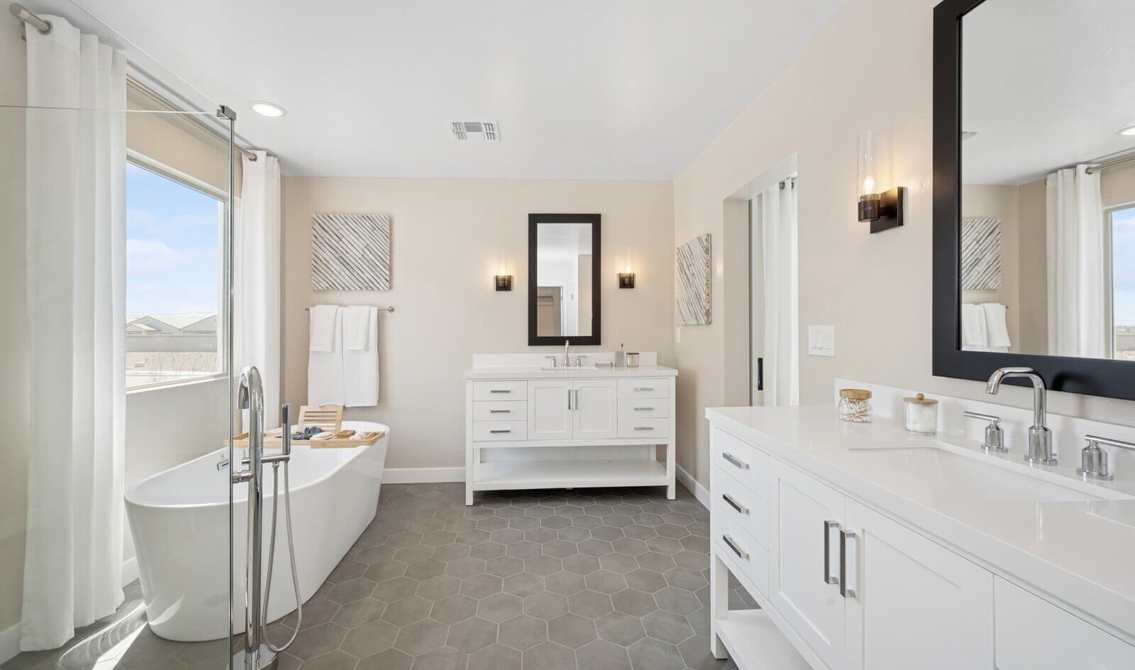 Primary bath with dual vanities and freestanding tub