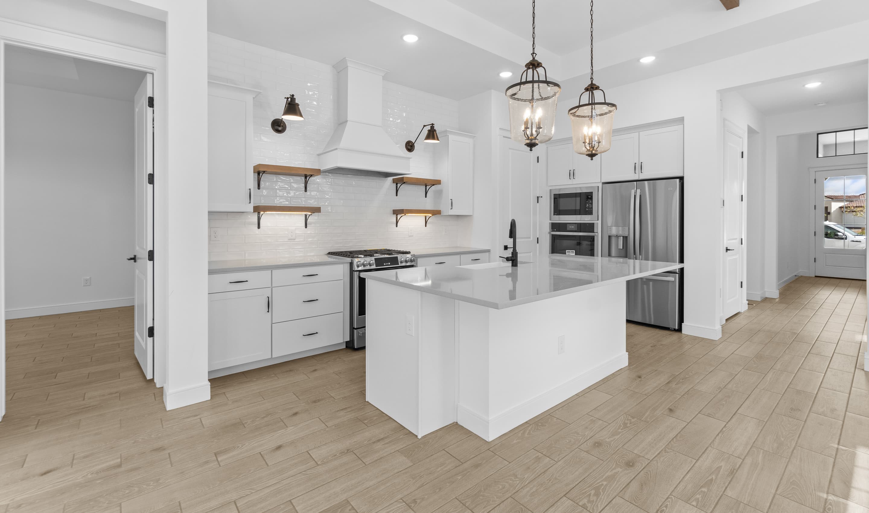 Kitchen with quartz countertop & island