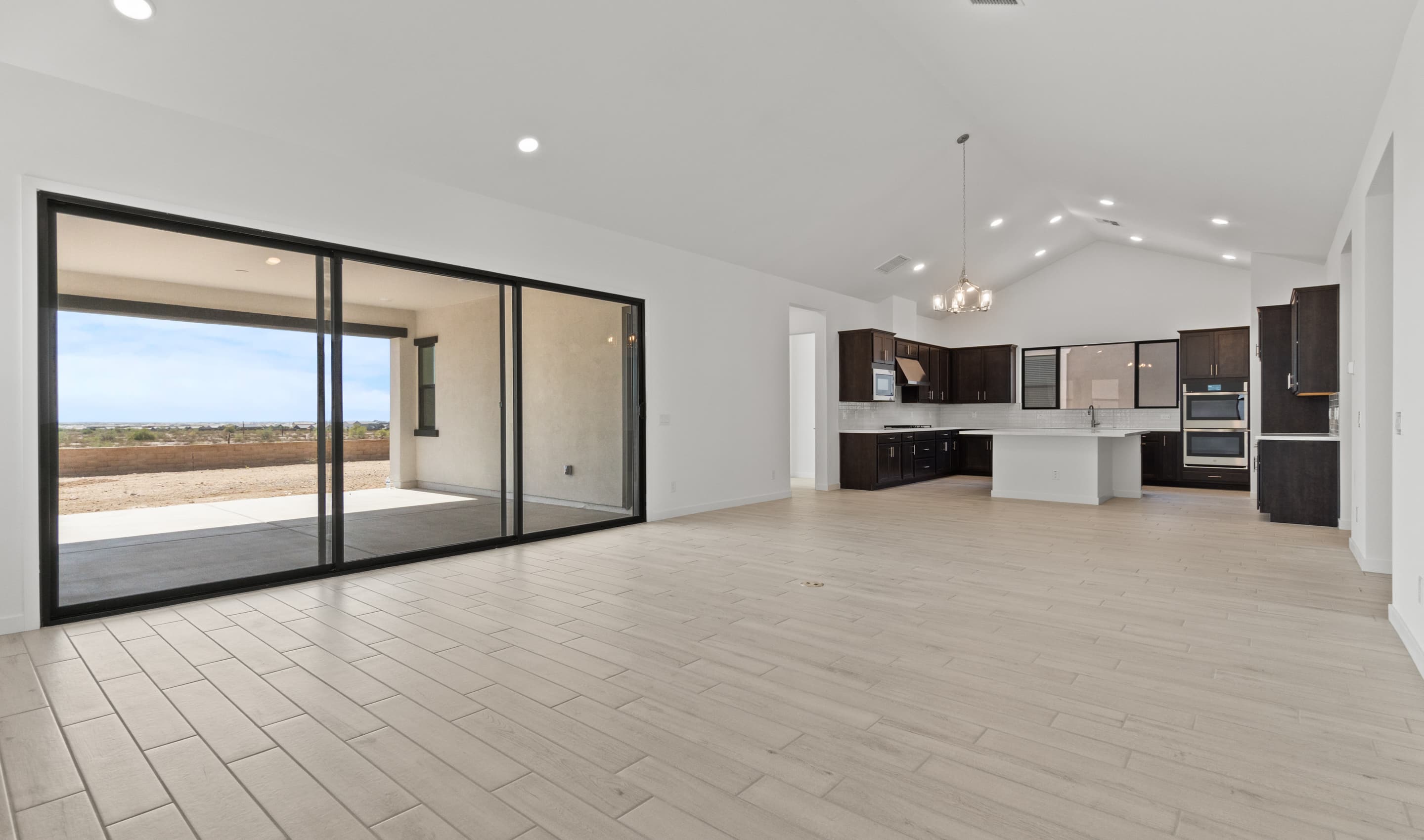 Great room with multi-slide door to covered patio