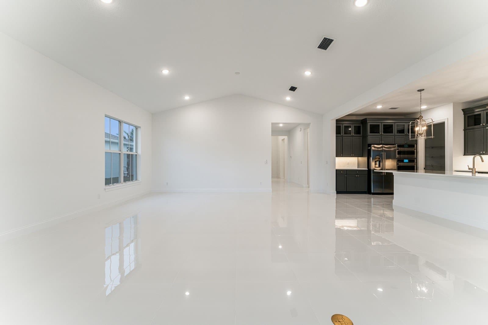 Open concept living spaces with vaulted ceiling